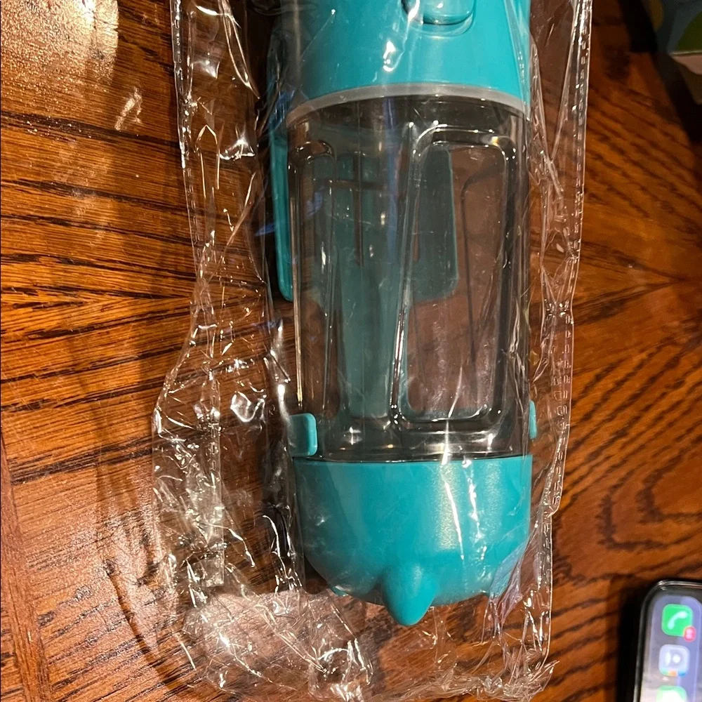 Pet Multifunctional Water Bottle with some little plastic bag inside New
